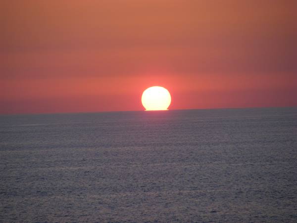 palla di fuoco in mare